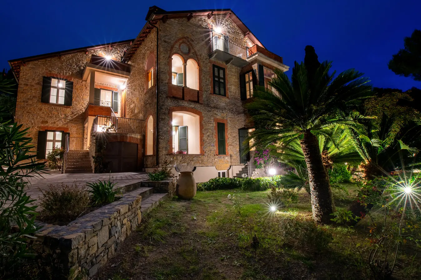 Villa Rappis lit up in the evening
